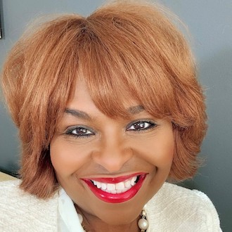 Woman smiling for camera.