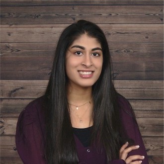 Woman smiling for camera.