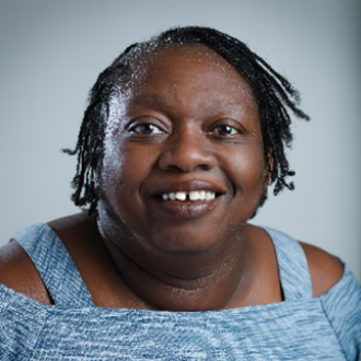 Woman smiling for camera.